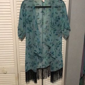 teal and mint leaf print pattern w/ black French